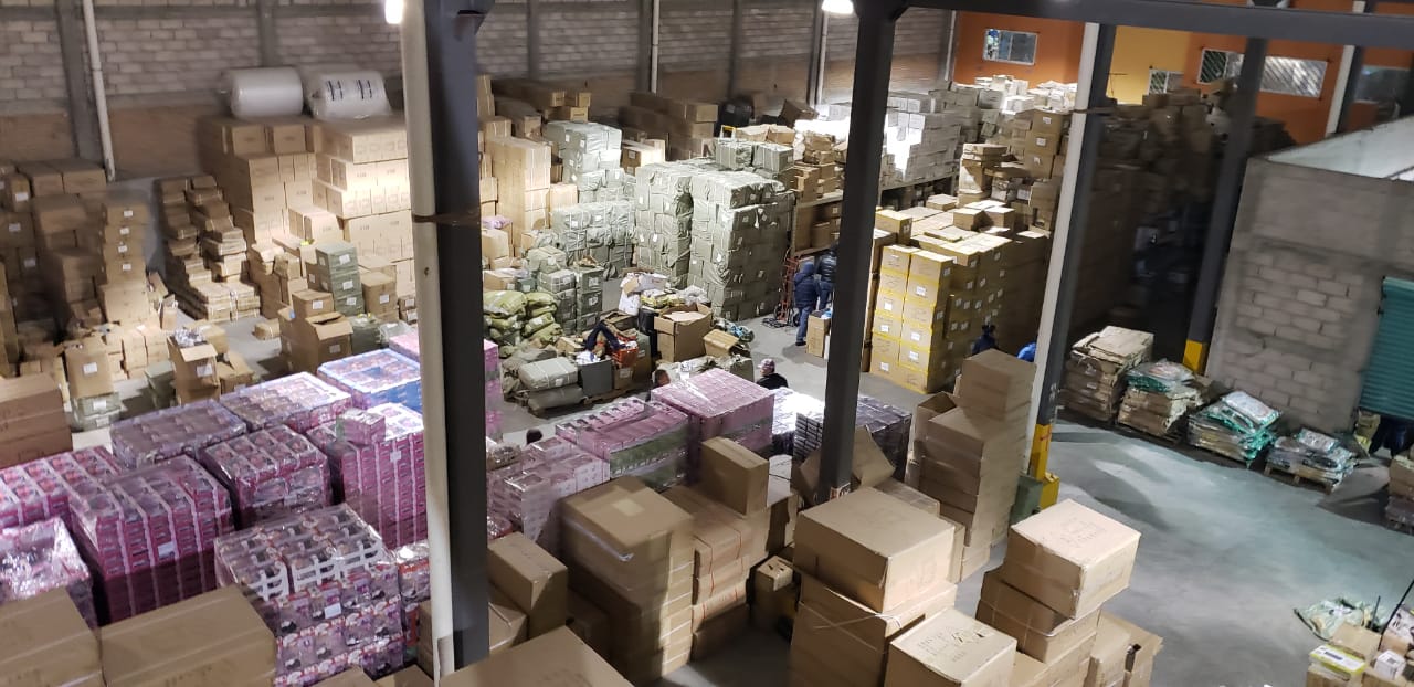Catea fiscalía mexiquense y policía federal un inmueble en la paz y localizan más de 22 mil cajas con mercancía clonada